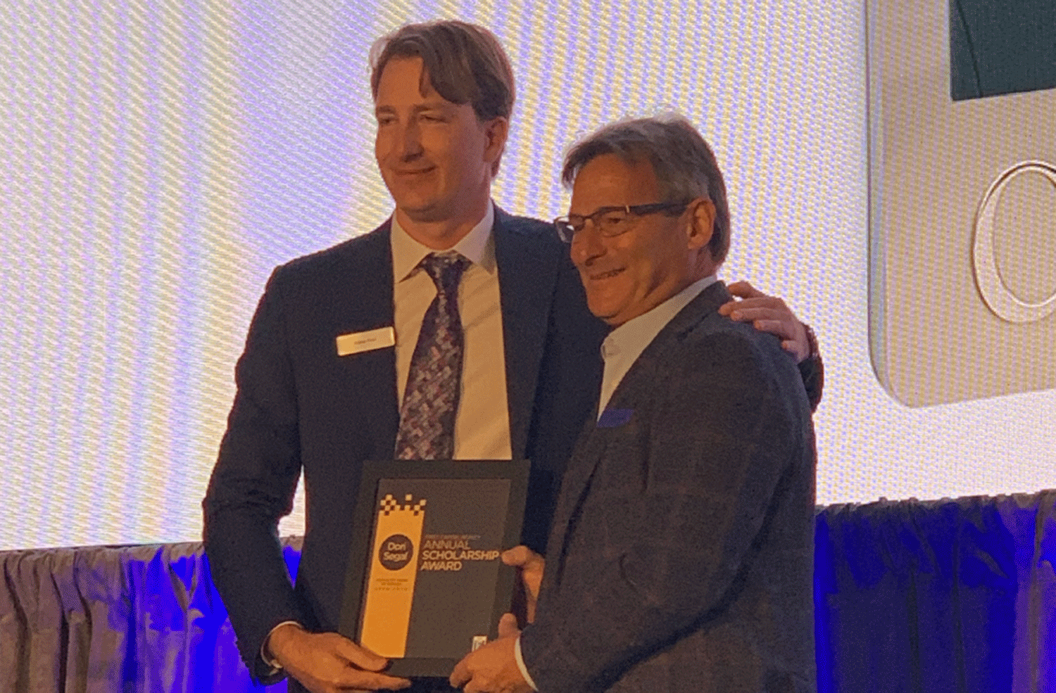 First Capital's annual general meeting in 2019 was held during more congenial times between the REIT's current CEO Adam Paul, left, and former CEO Dori Segal, right. Segal is now backing an activist investor that wants management changes at First Capital. (Garry Marr/CoStar)